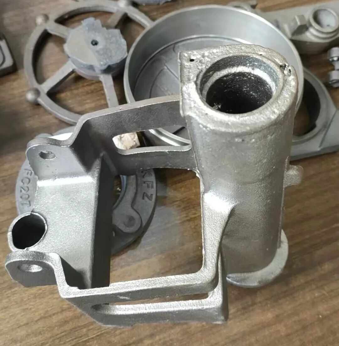 Behandling för svår porositet i cylindriska rörformiga sandkärnor under tillverkning av segjärnsdelar med grön sandformningsteknik